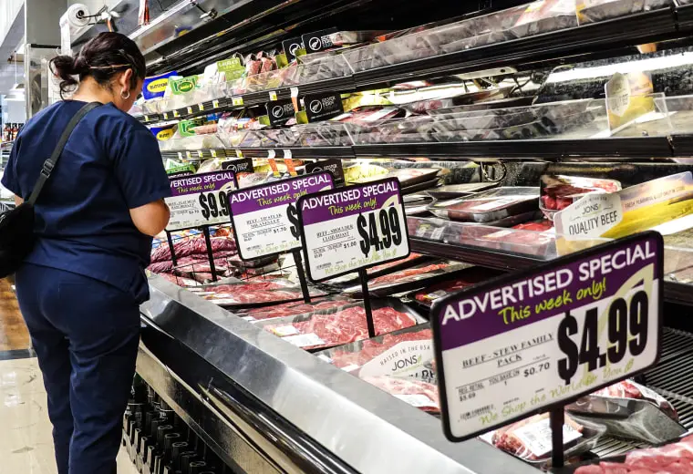 Beef is advertised for sale in a grocery store on Sept. 13, 2022 in Los Angeles.