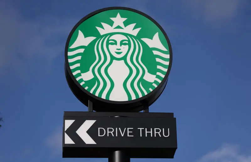 Here's a roundup of quarterly earnings reports from Starbucks, Ford and Qualcomm