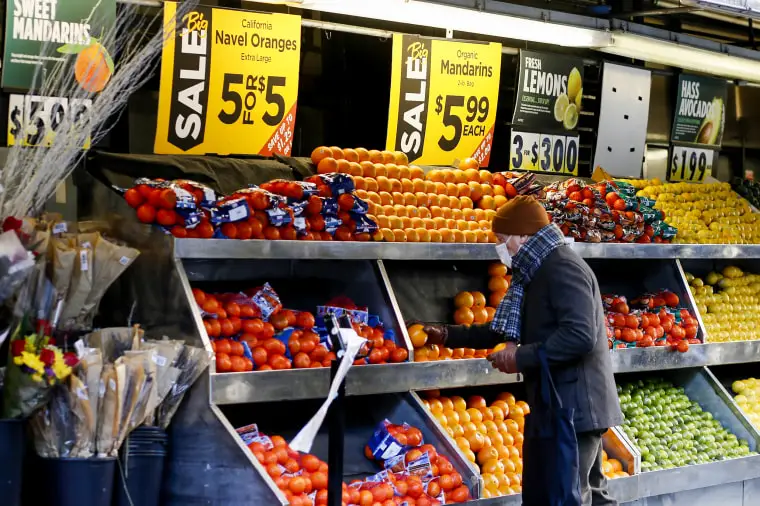 A man shops for fruit at a grocery store on Feb. 1, 2023, in New York.