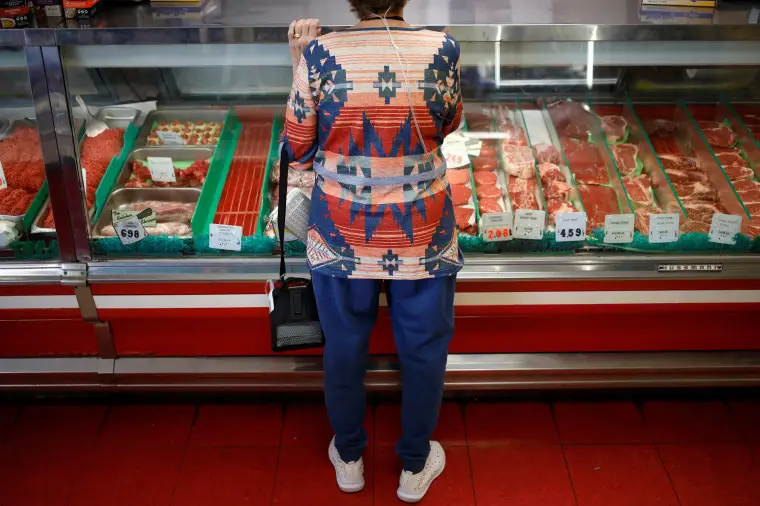 A customer at a butcher shop in Louisville, Ky. 