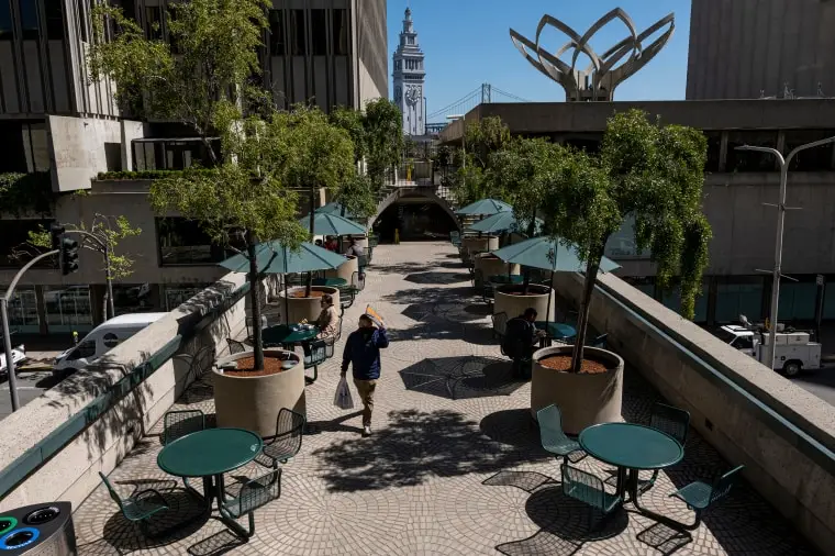 A pedestrian on The Embarcadero Center in San Francisco in 2022. 