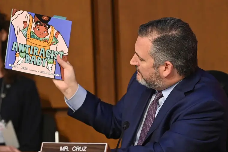 Sen. Ted Cruz holds the children's book "Antiracist Baby" during the confirmation hearing for Judge Ketanji Brown Jackson on March 22, 2022. 