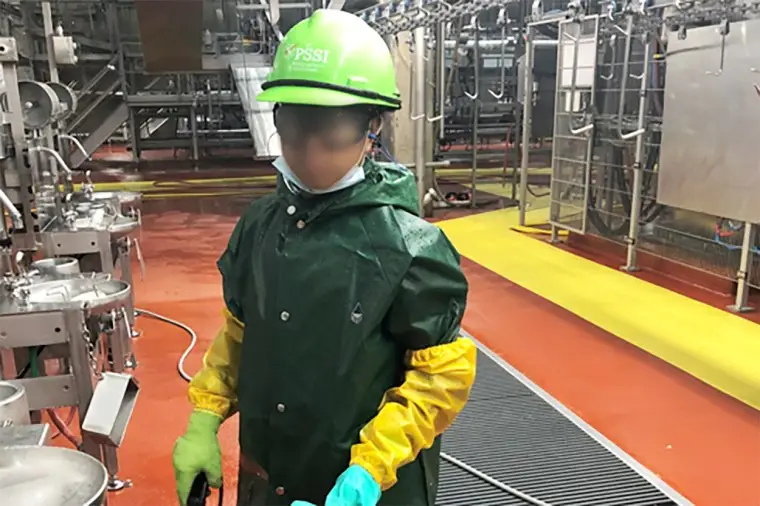Photo taken by Department of Labor investigator of a child who worked for Packers Sanitation Services Inc. (PSSI).
cleaning a slaughterhouse in Grand Island, Nebraska.