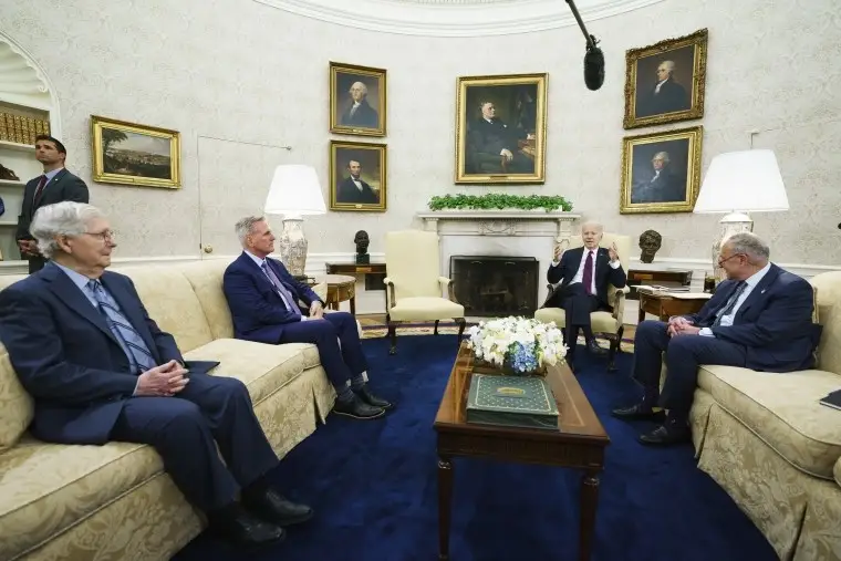Sen. Mitch McConnell, Rep., Kevin McCarthy and Sen. Chuck Schumer speak with President Joe Biden in the Oval Office