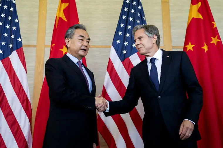 Chinese Foreign Affairs Minister Wang Yi shakes hands with Secretary of State Antony Blinken at a meeting on the Indonesian resort island of Bali in July 2022.