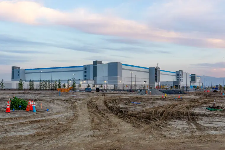 An Amazon fulfillment center under construction in Ontario, Calif., on March 17, 2023. 