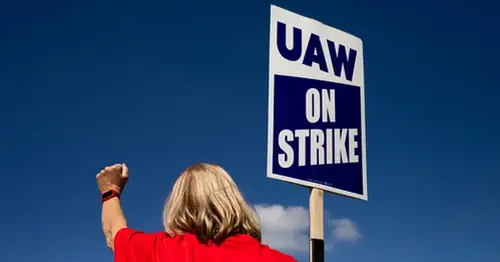 UAW announces new strike locations at GM, Stellantis as walkout stretches into second week